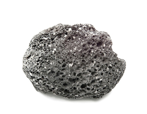 17925615 - scoria volcanic rock isolated on white